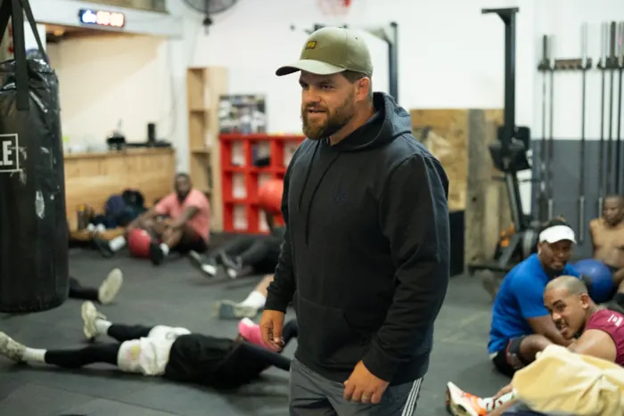 Jonathan Raphael coaching a class on the Goliath floor